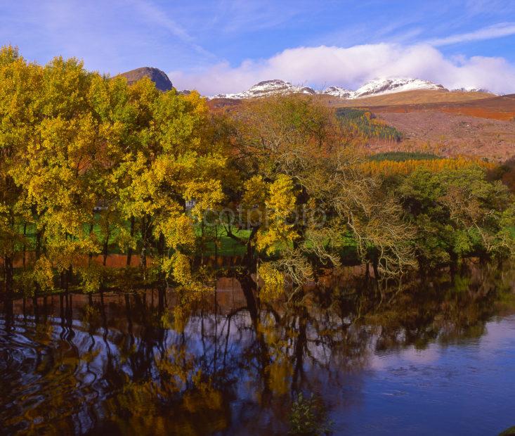 Peaceful Autumn Reflections On The River Lochy Towards Ben Lawers Near Killin Perthshire