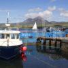 YACHT SAILS PAST PORT ASKCAIG ISLAY