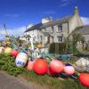 Houses On Tiree With Buoys