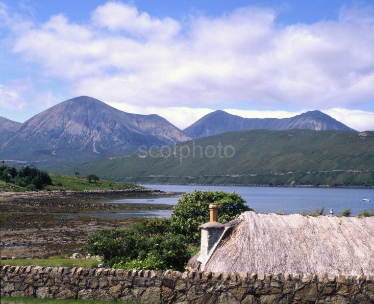 Thtached Croft And Cuillins