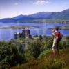 Hiker Overlooking Eilean Donan Castle