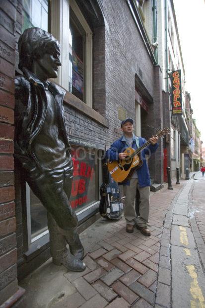 Busker In Mathew Street Nr John Lennon Statue