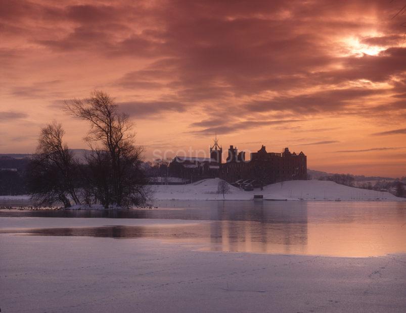 Winter Sunset From A Frozen Loch Towards Linlithgow Palace West Lothian