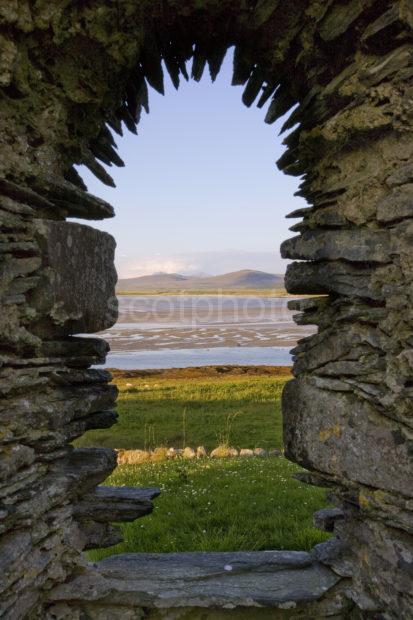 View Across Loch Gruinart Through Window At Kilnave Chapel