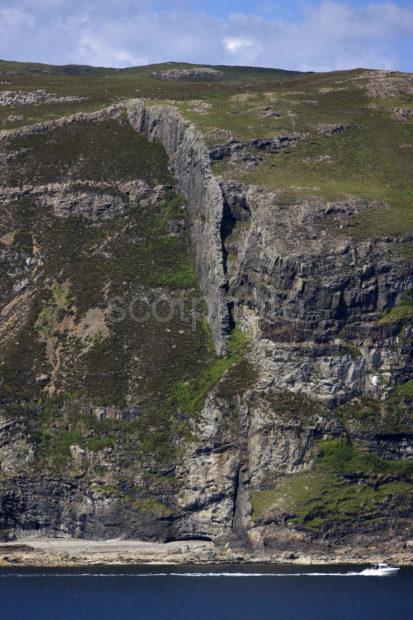 A Geological Dyke Cuts Through Bedrock Morvern Sound Of Mull