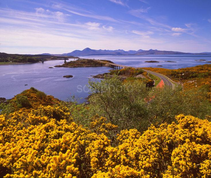 Spring View Towards The Skye Bridge And Distant Cuillins As Seen From Kyle Of Lochalsh North West Highlands