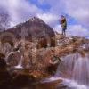 A Dramatic View Of Buchaille Etive Mhor With A Piper Playing A Haunting Melody West Highlands