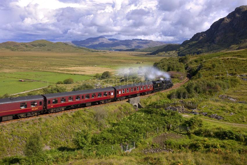 The Jacobite Steam Train Hauled By A Black 5 Nears Morar Then Mallaig