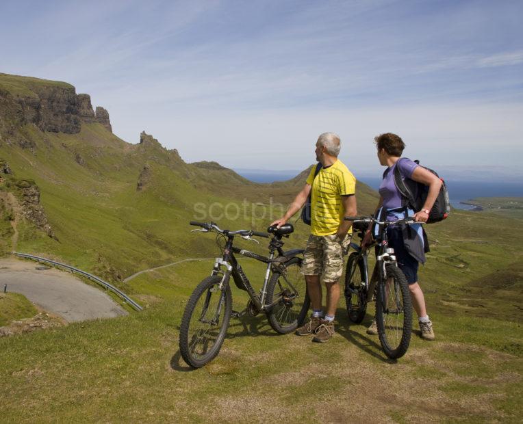 Cyclists Pause At Quiraing And Storr Rock Nr Staffin Skye