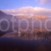 Late Autumn Mist Rises Over Kilchurn Castle On Loch Awe Argyll