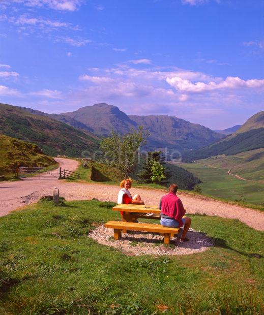 Tourists Enjoy The Dramatic View Down Glen Croe From The Picnic Area At Rest And Be Thankful South Argyll