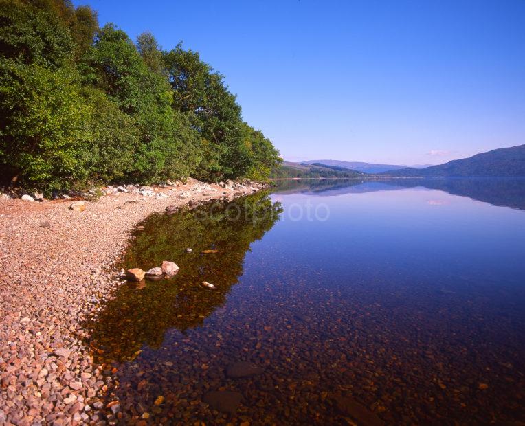 Peaceful Reflections On Loch Arkaig Lochaber Region