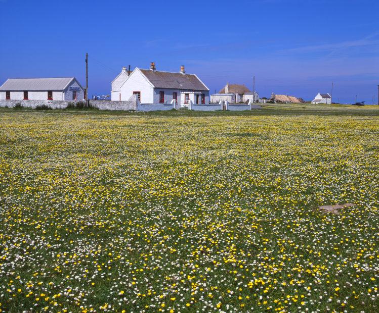 The Tiny Village Of Sandaig On The West Coast Of Tiree From The Machair Island Of Tiree Hebrides