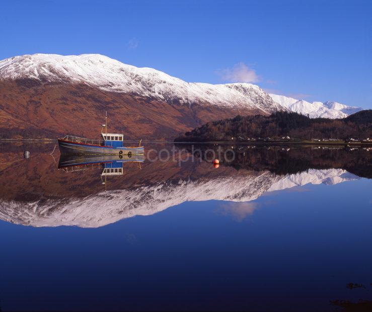 Peaceful Winter Reflections On Loch Leven With Mamore Hills And Glencoe In The Distance