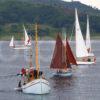 3X8G8571 Yachts Gather Outside Harbour Entrance TL