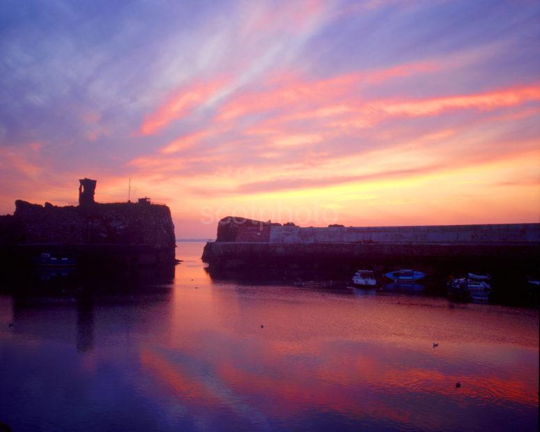 Dunbar Castle And Harbour At Sunset East Lothian