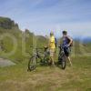 Two Cyclists Pause To Take In View At Quiraing Pass Skye