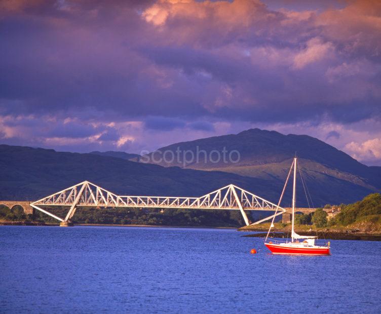 Evening Light Strikes Connel Bridge As The Mouth Of Loch Etive Argyll