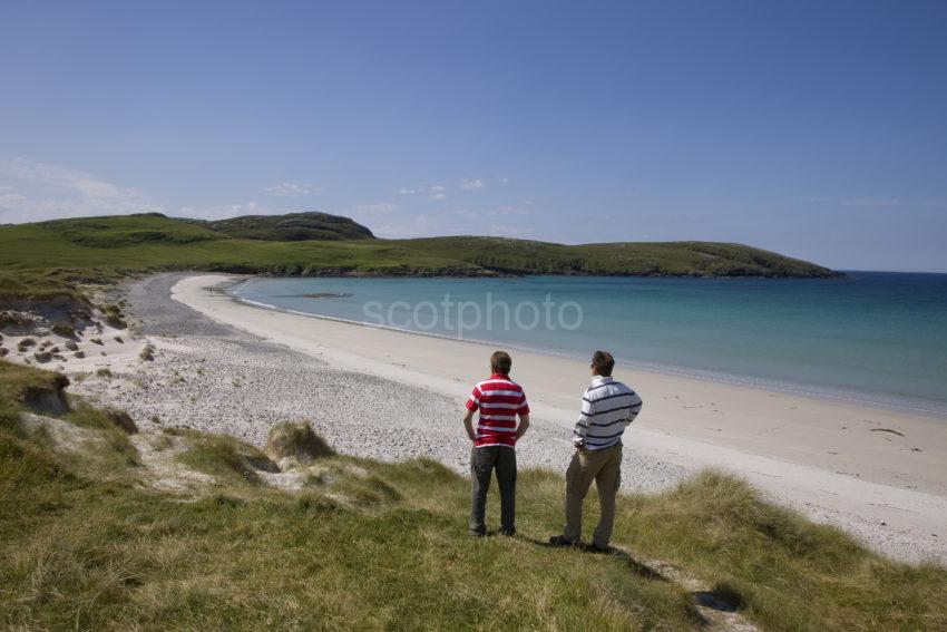 Tourists Admire The Beaches On Vatersay