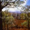 Peaceful Autumn View Through Trees Towards Distant Snow Clad Ben Nevis From Spean Bridge Lochaber West Highlands