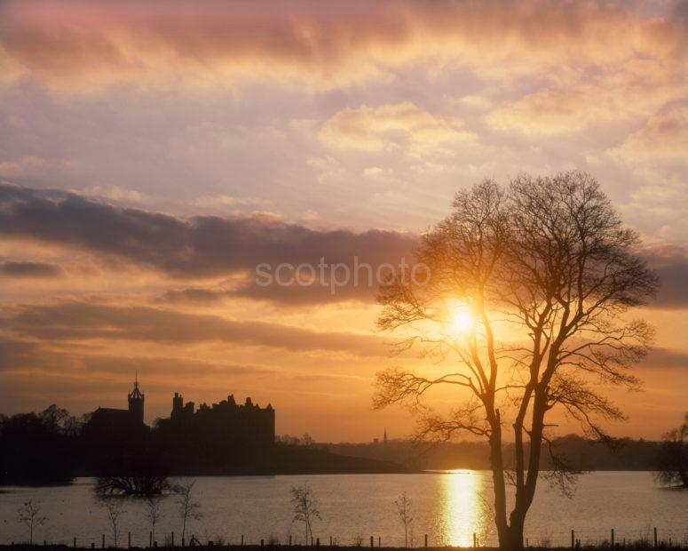 Sunset Over Linlithgow Palace From Shore Of Loch