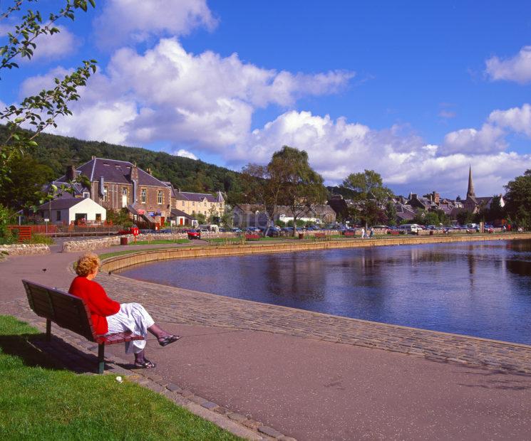 Summer View From The River Teith In The Popular Village Of Callander Central Scotland