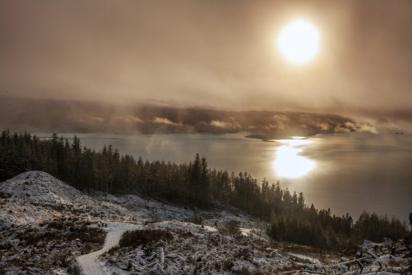 Dramatic winter sunset over the forest trails on Ben Lora, Benderloch, Argyll