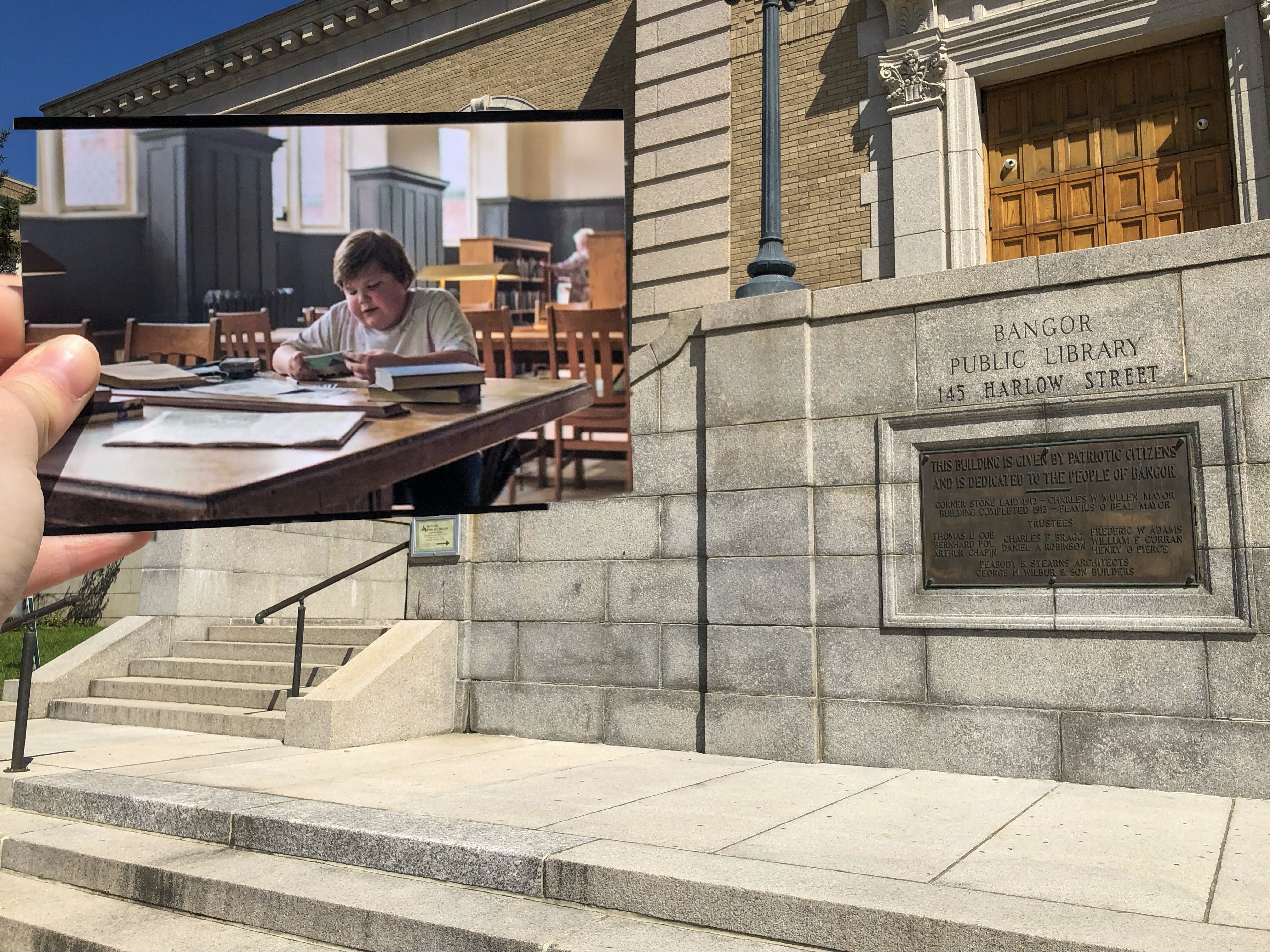 A photo taken from IT 1 of Ben Hanscom sitting in the Derry Library learning about Derry history put in the actual location that inspired the image.