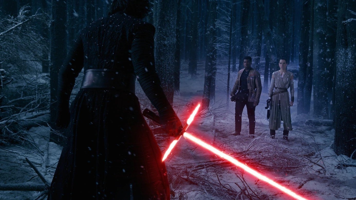 Kylo Ren with his lightsaber.
