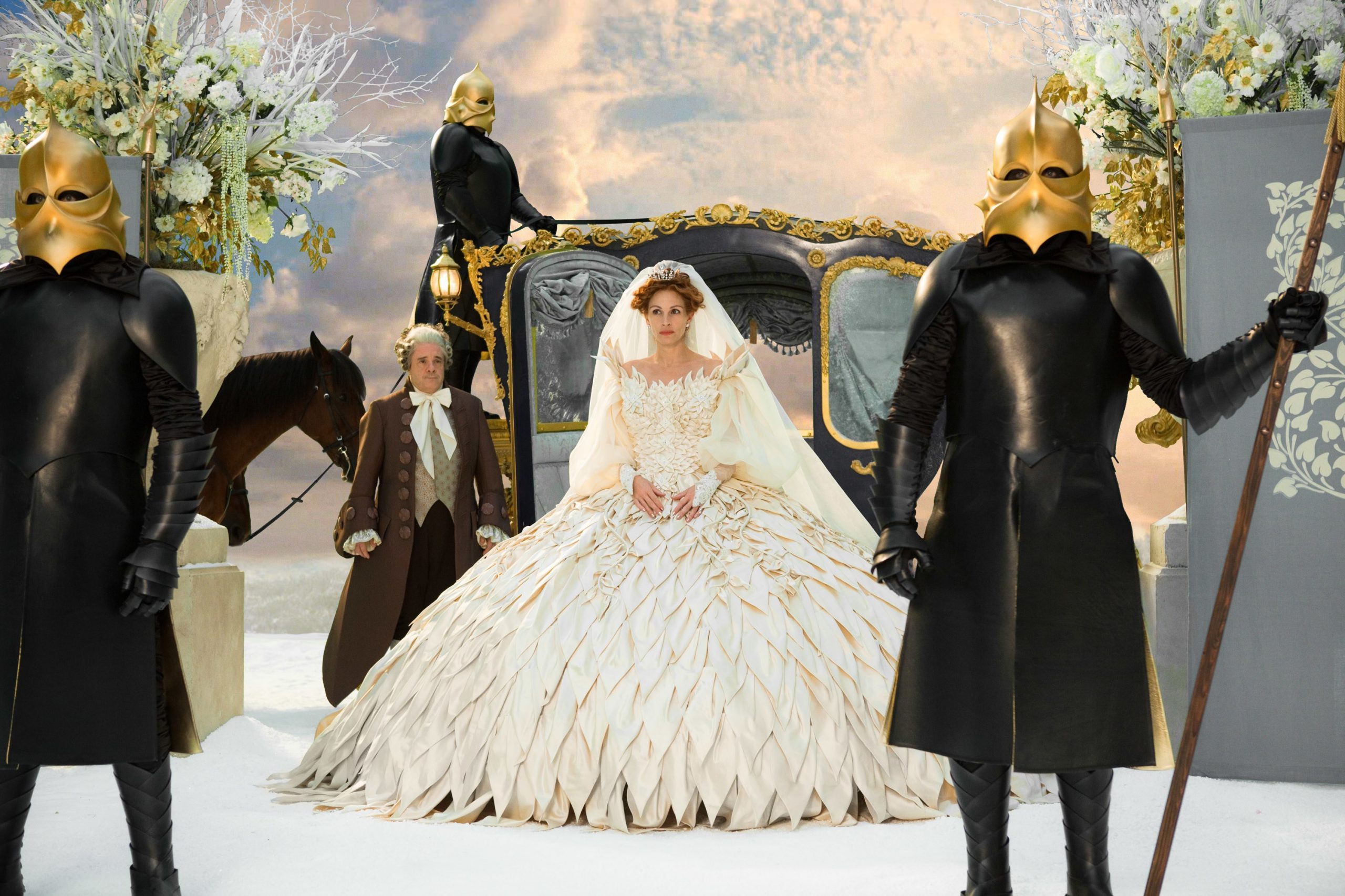 The queen arriving at her wedding to the prince.