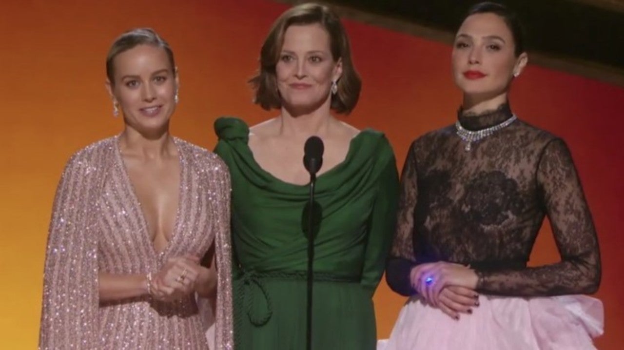 Brie Larson, Sigourney Weaver, and Gal Gadot present the award for Best Original Score for a Motion Picture.