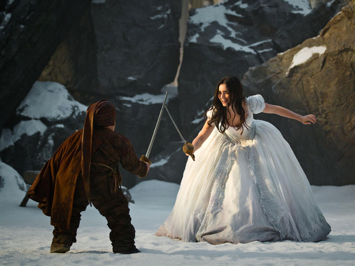 Princess Snow White trains with a sword.