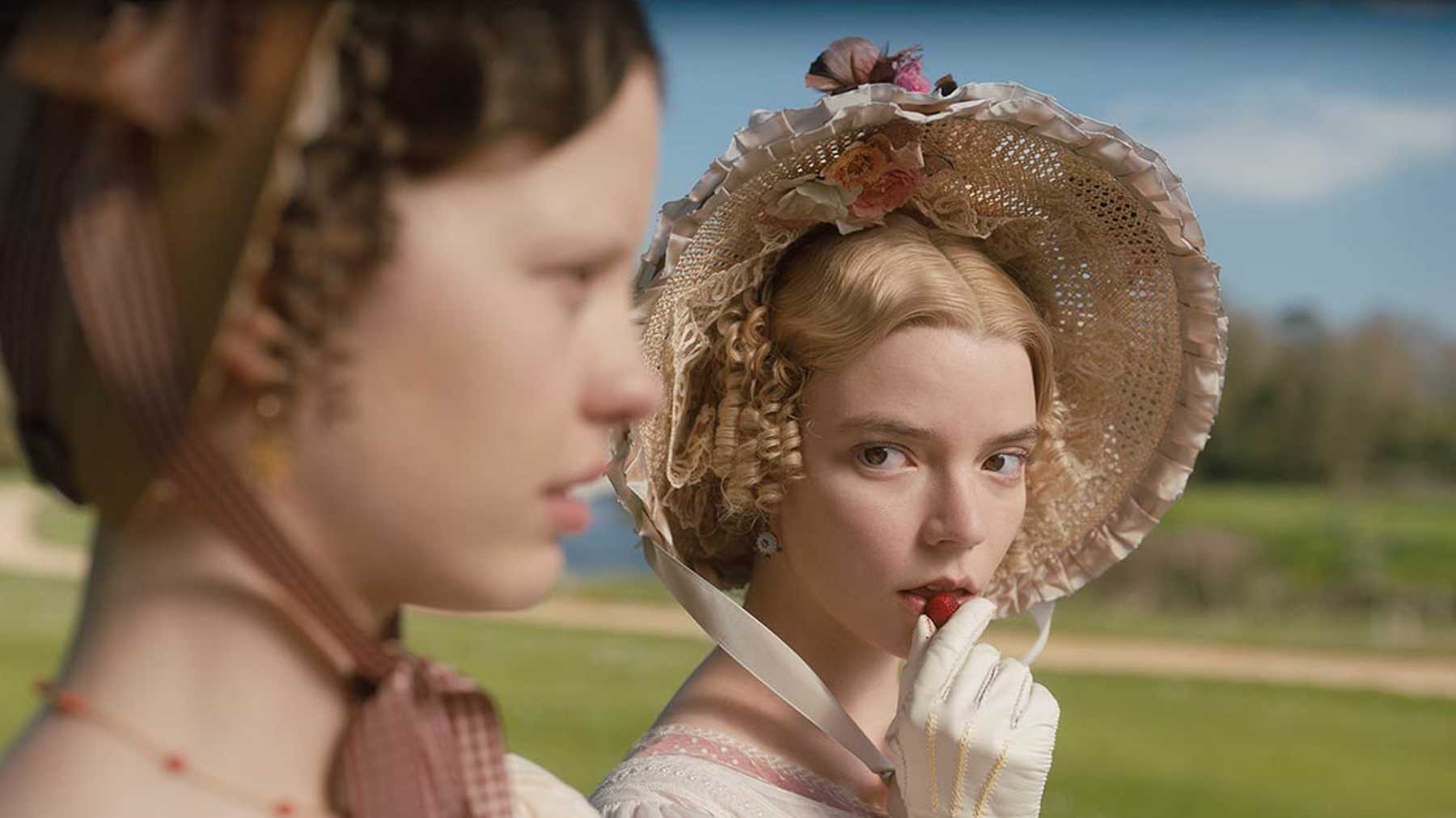Emma Woodhouse holding a strawberry to her lips, a view of femininity along with a series of cinematic soundtracks by Isobel Waller-Bridge.