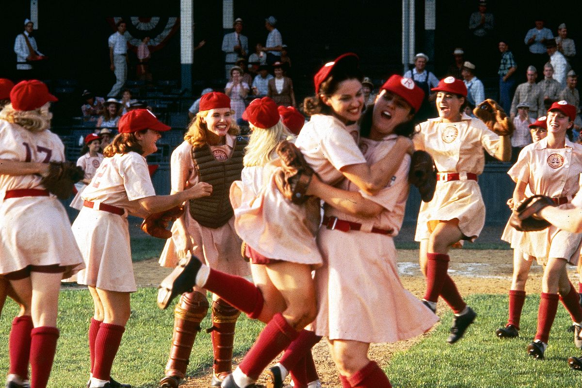 The Rockford Peaches after winning a game, showing excitement to bring up your baseball spirit.