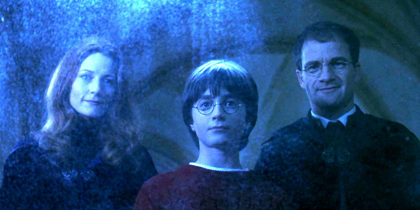 Harry looks at Lily and James Potter in the Mirror of Erised,
