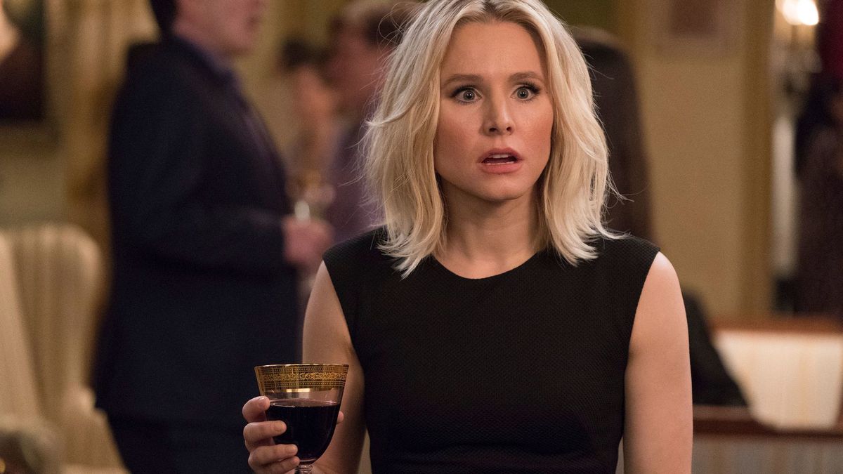 Eleanor looks surprised and holds a wineglass in The Good Place.