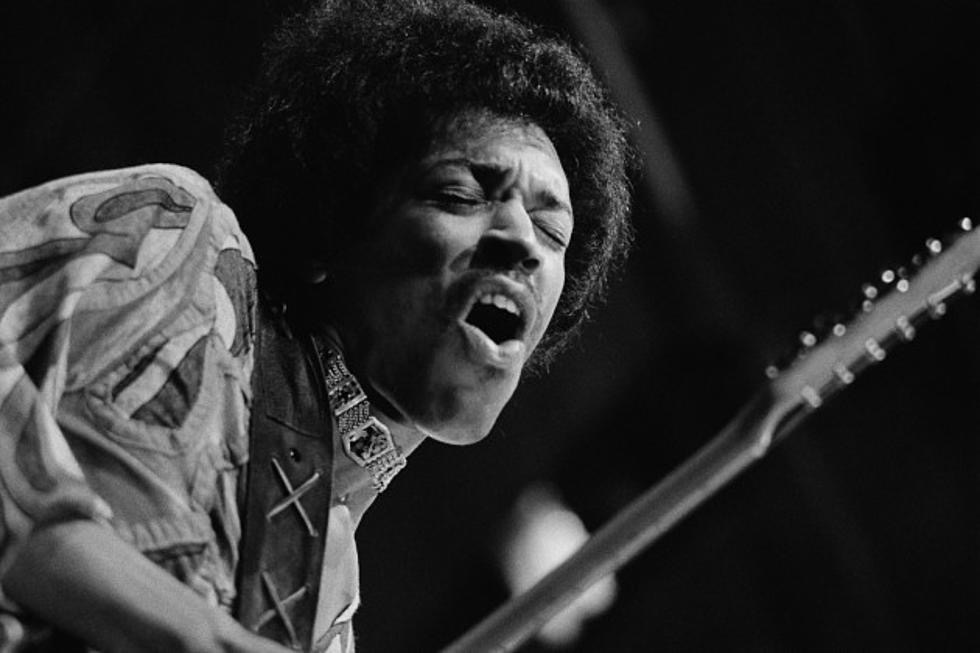 Jimi Hendrix performs his music of a different time with his guitar and his powerful vocals. 