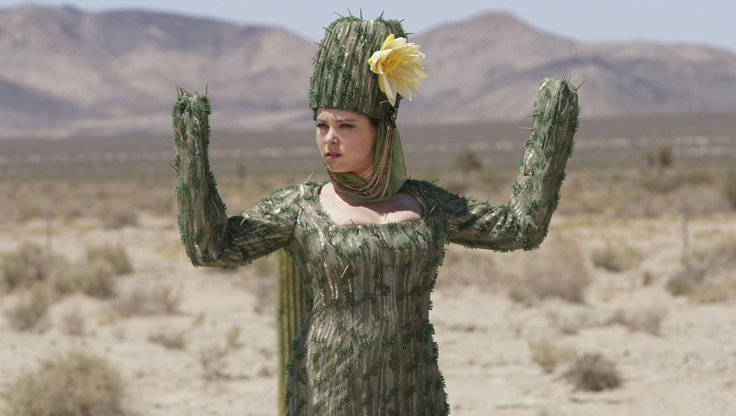 Rebecca poses in a cactus outfit in Crazy Ex-Girlfriend.