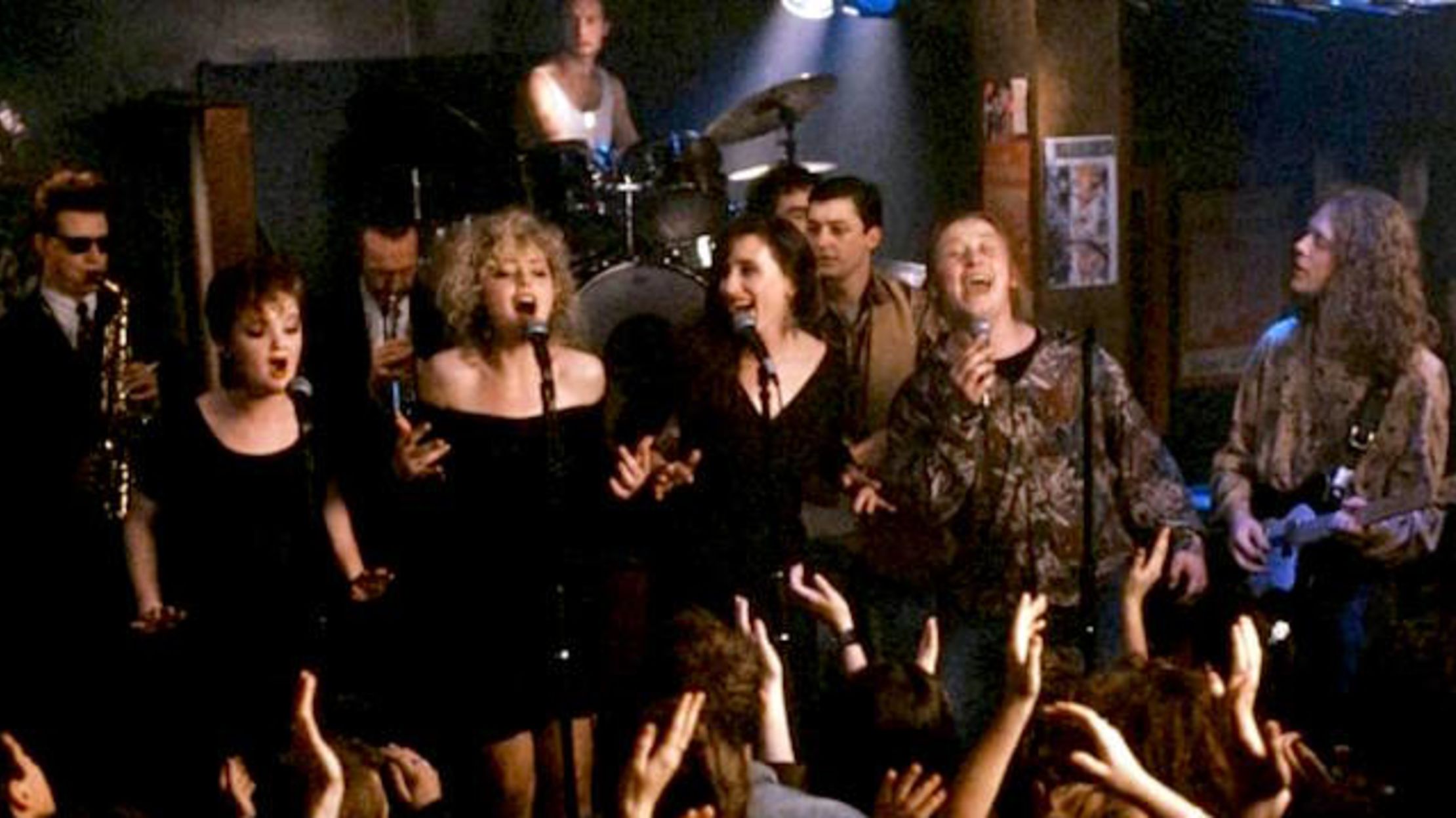 Band members in "The Commitments" perform a musical number.