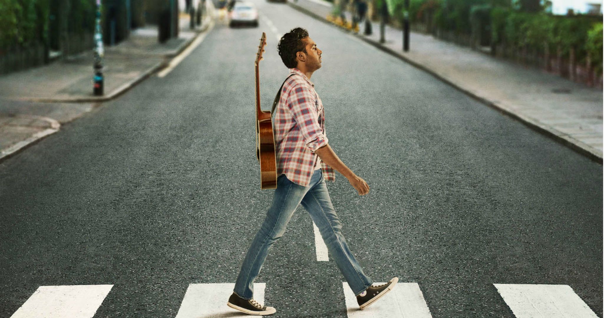 The character of Jack recreates the famous "Abby Road" record cover all by himself in the poster for this musical.
