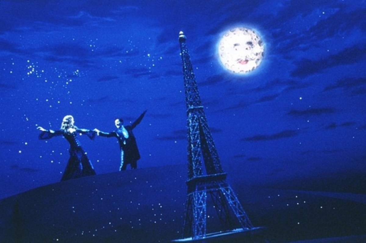 Baz Luhrmann's vision comes to life as a smiling moon looks upon Christian and Satine. 