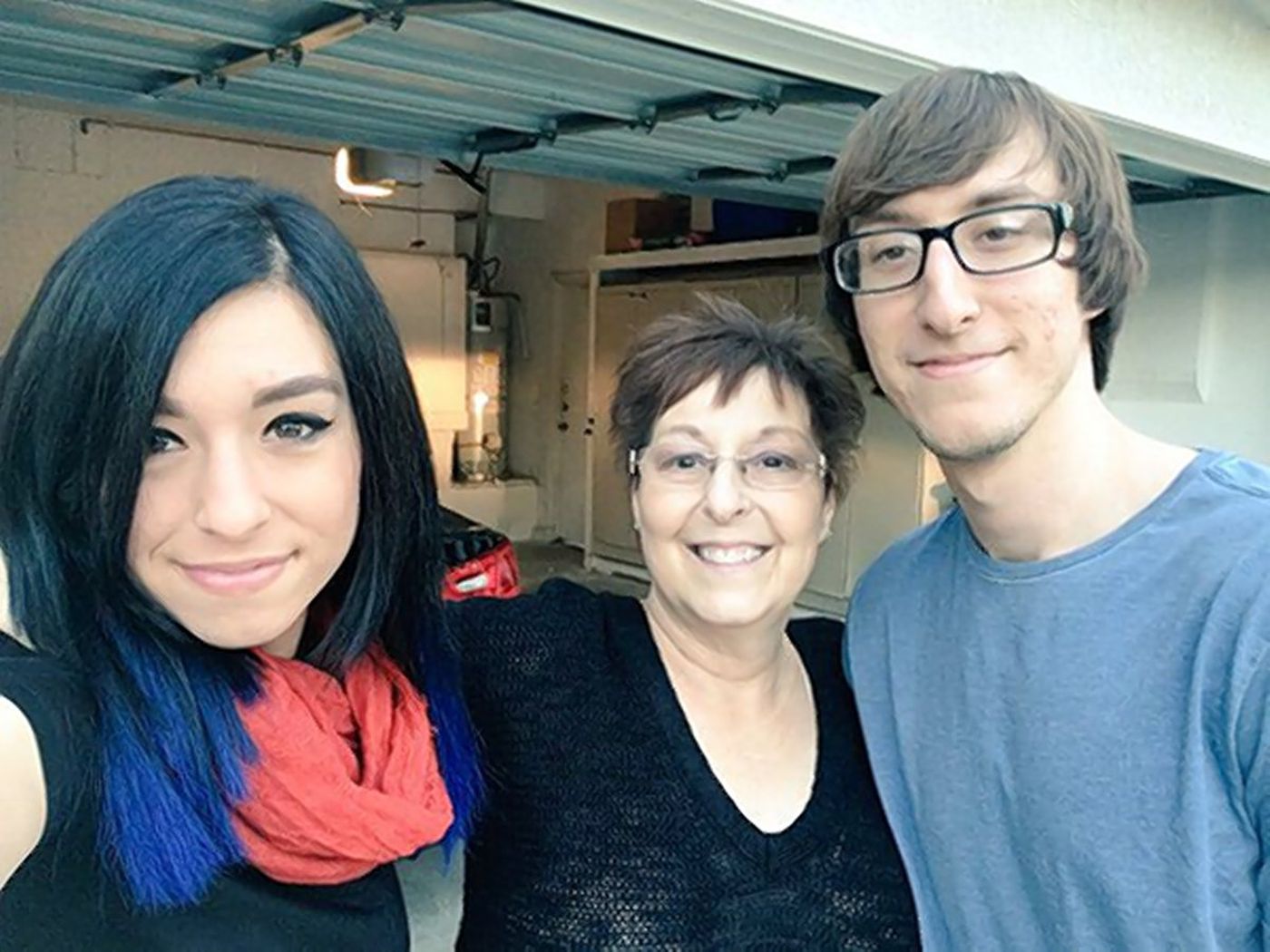 Chrstina, her mom Tina, and her brother Mark pose in a selfie from 2016. 