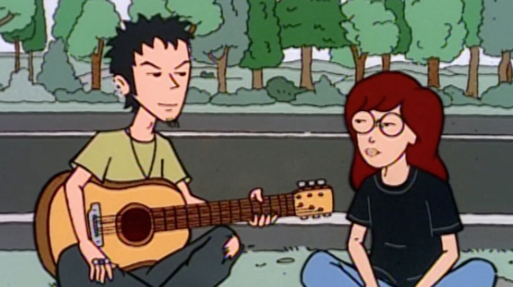 Daria sit on the side of the road with Trent Lane, who has a guitar in his lap. 