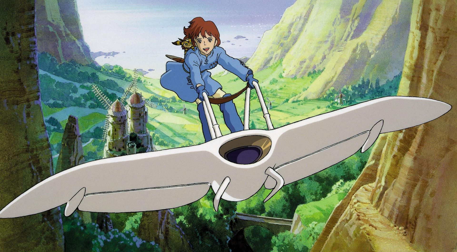 Nausicaa along with Teto, her pet fox-squirrel, fly above the Valley of the Wind on her glider. 