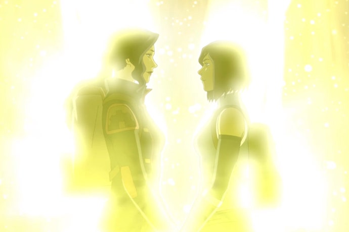 The Legend of Korra LGBTQIA+ ending. Korra and Asami staring into each other's eyes in front of the golden lights of the spirit world. 