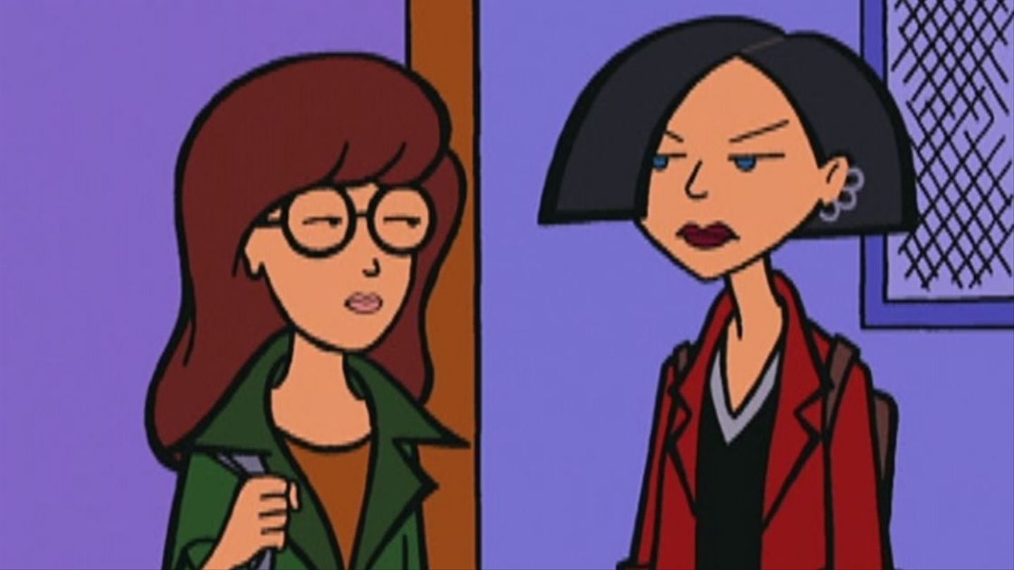 Daria and Jane stand in the classroom, looking at teacher other. However, Jane looks unamused and angry. 