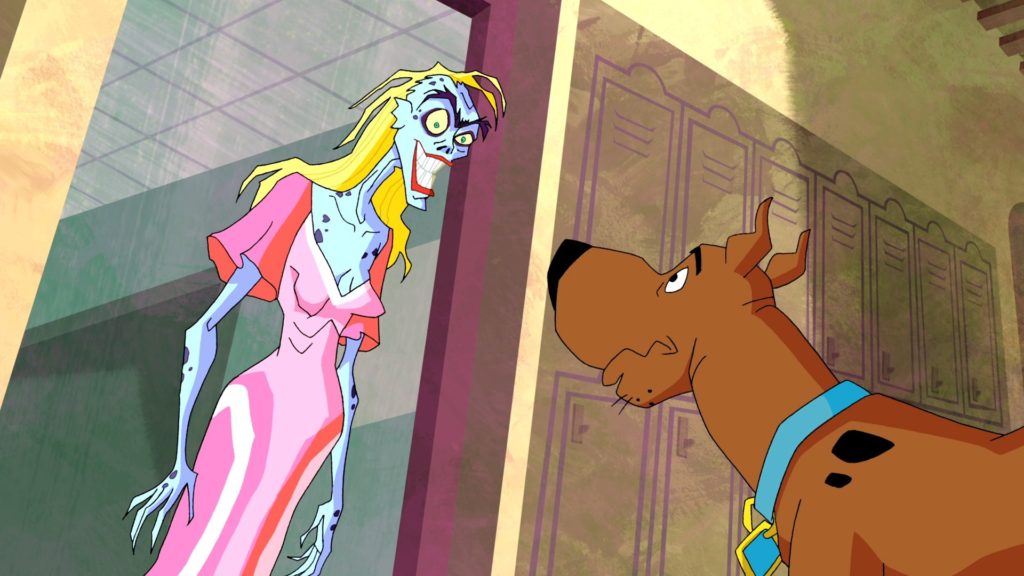 Scooby looks at a woman with blue, mottled skin in a pink dress with a wide, ominous grin.