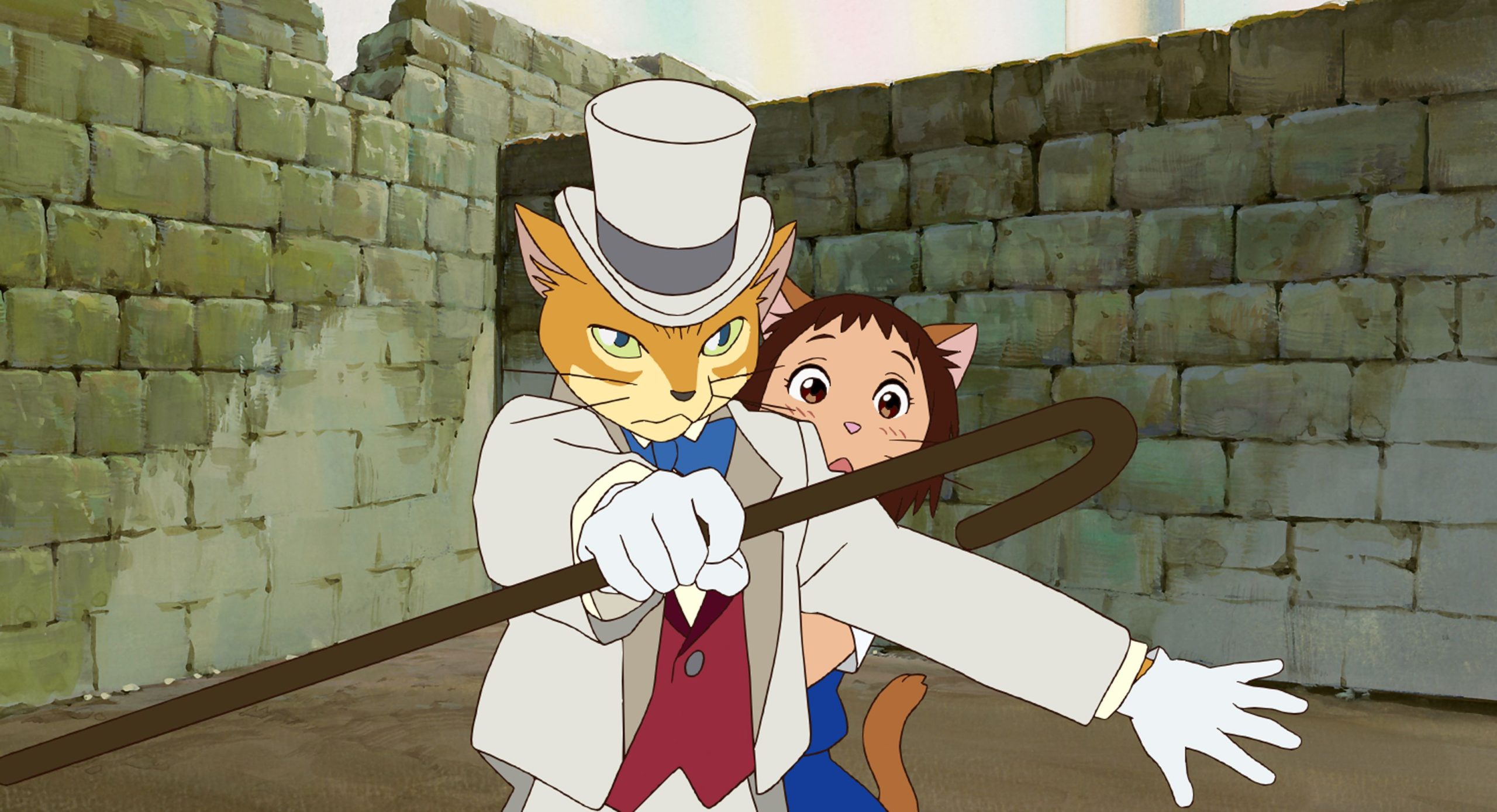 The Baron holds a cane in a white gloved hand and stands in front of Haru.