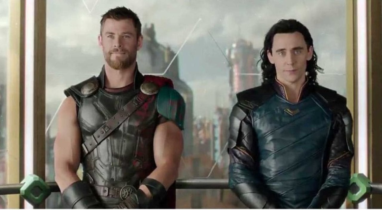 Thor and Loki sand side by side in an elevator in MCU film Thor: Ragnarok.