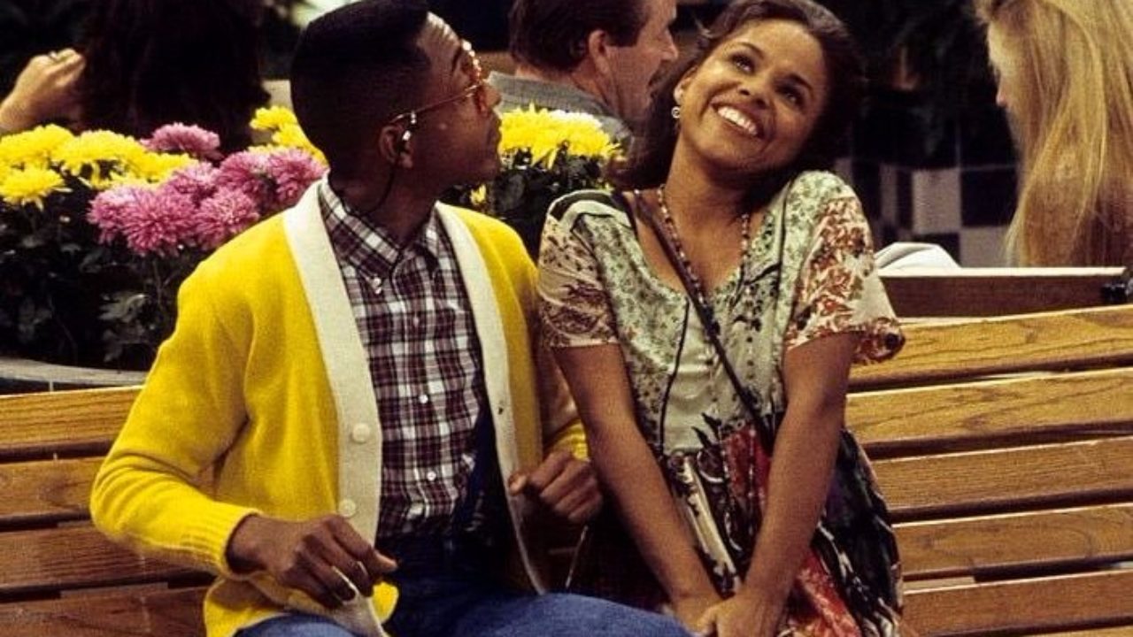 Steve looks at a smiling Myra in Family Matters.